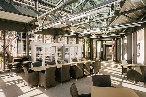 Vending machines in the atrium, tables in front